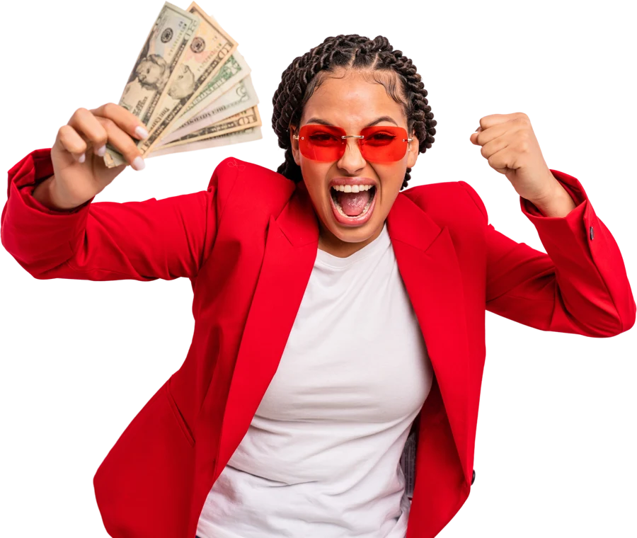 A winner celebrating with dollar banknotes in hand